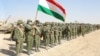 Members of Tajikistan's armed forces line up during joint military drills involving Russia, Uzbekistan, and Tajikistan at the Harb-Maidon training ground near the border with Afghanistan on August 10.
